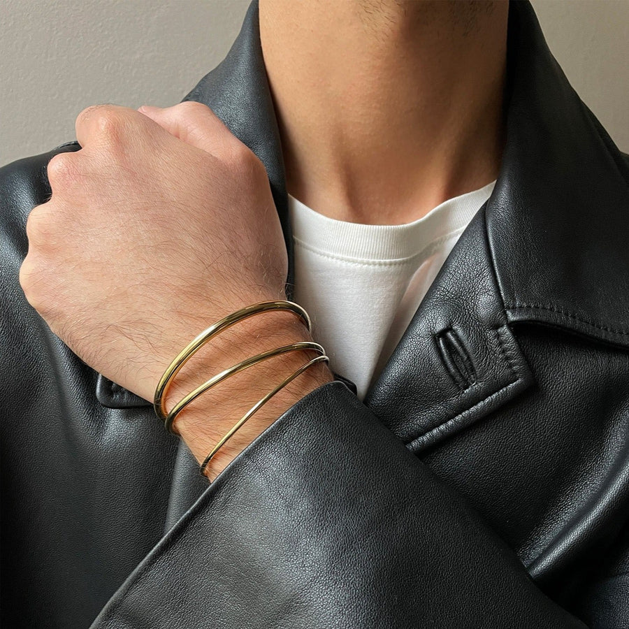 Trio of open vermeil bangles 